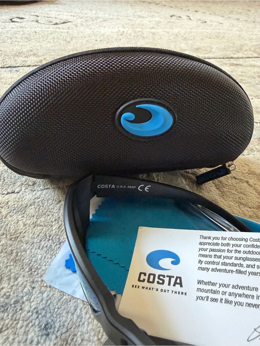 Costa Black Frame Sunglasses with Blue Mirrored Lenses